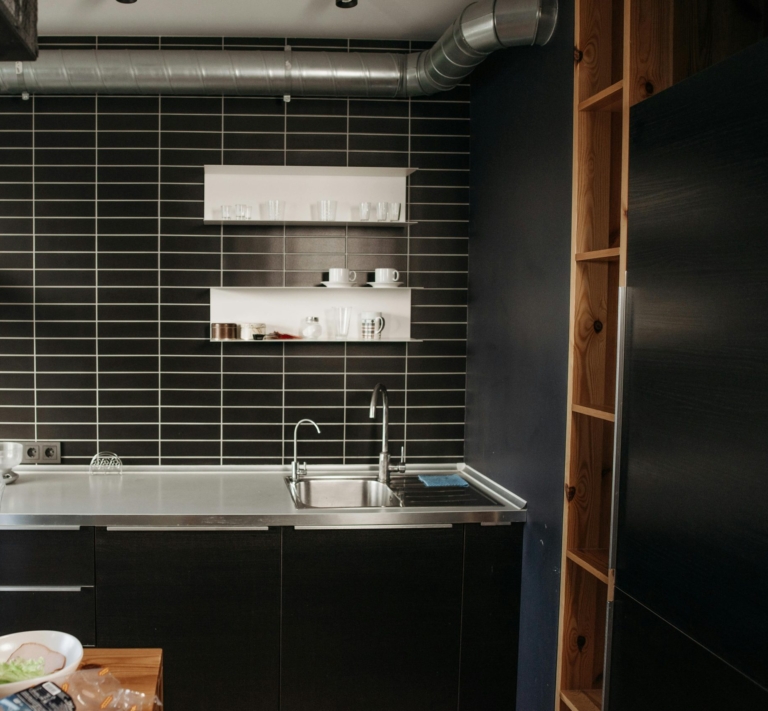 Modern kitchen with exposed ductwork