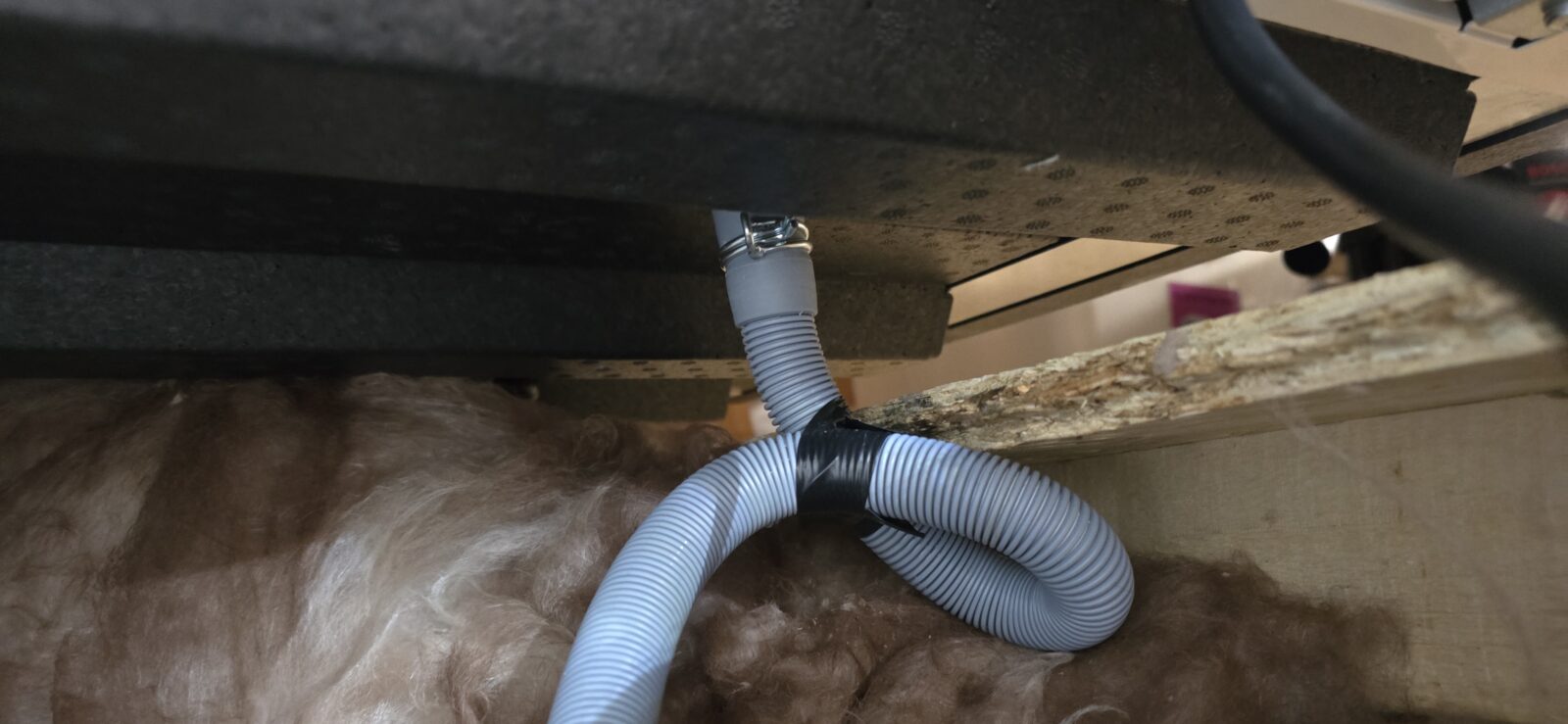 Washing machine drain hose used as a condensate drain