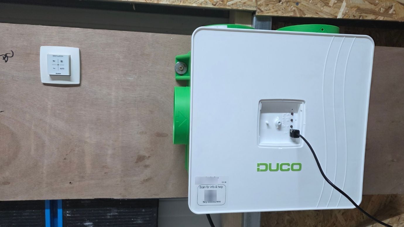 DUCO DucoBox Focus: Demand-Controlled Ventilation Explained - Eco Vent Ireland DucoBox Reno and DUCO user controller mounted on a test board in the Eco Vent Ireland workshop