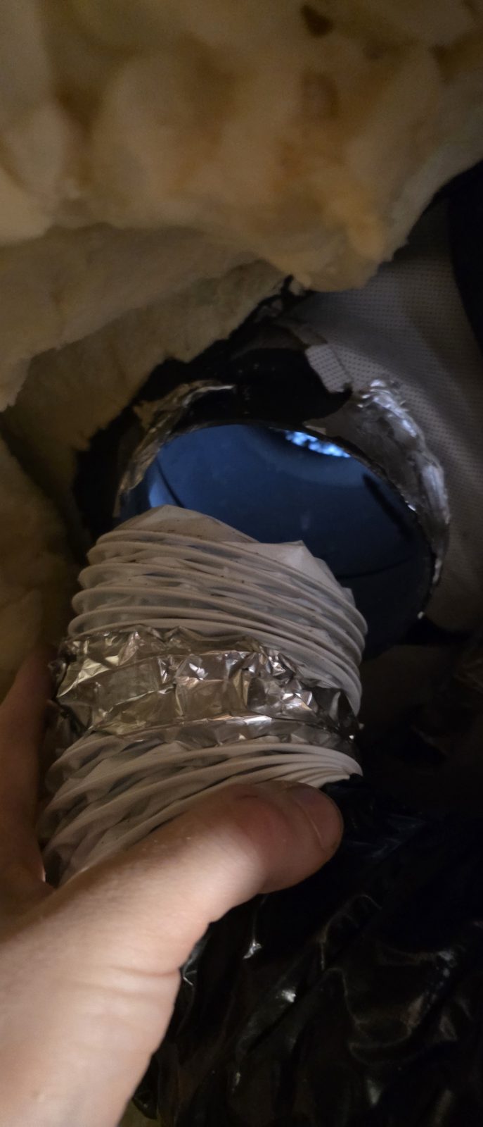 MVHR Servicing in Galway - Eco Vent Ireland Flexible 125 mm exhaust duct forced onto a 100 mm connection in an attic