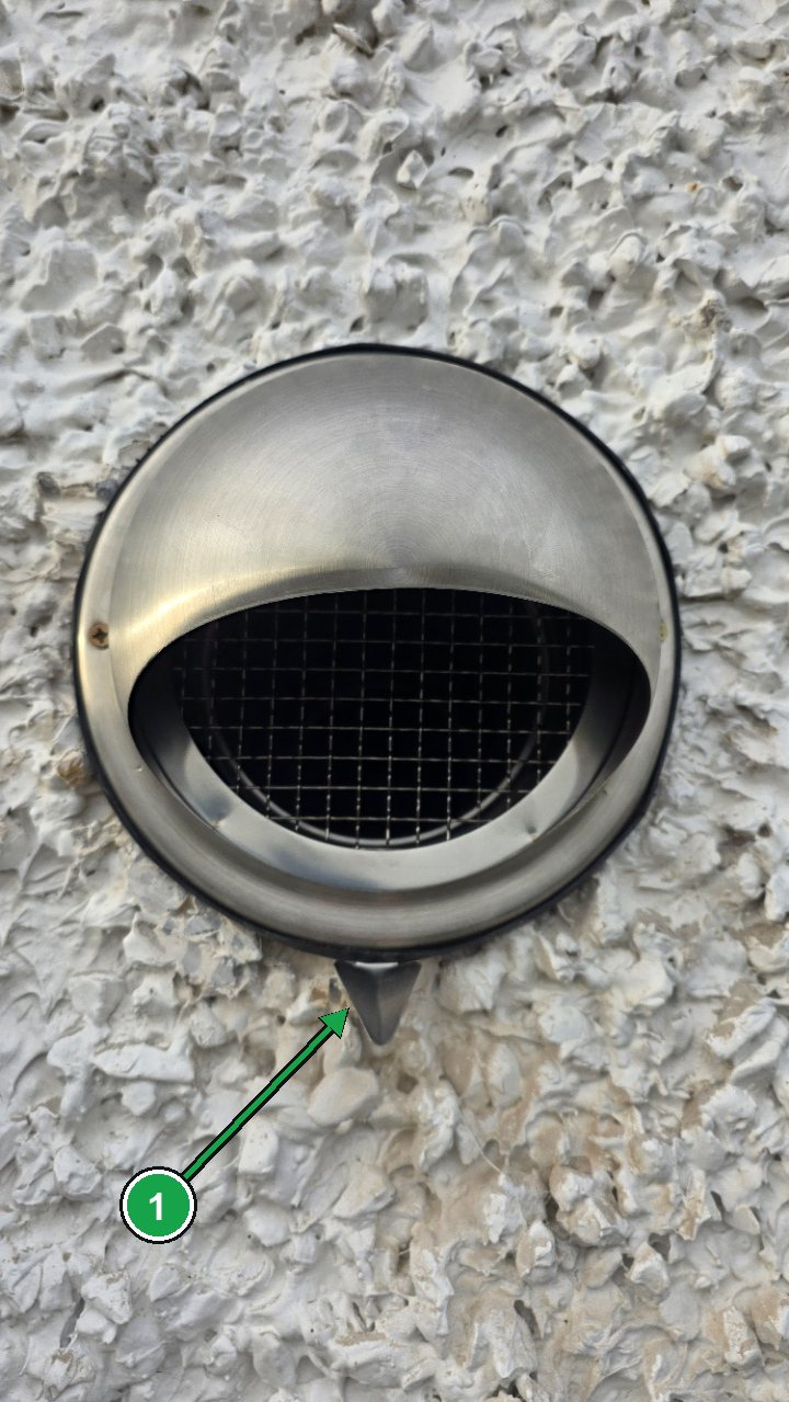 Stainless steel external ventilation grille with a drip below the cowl