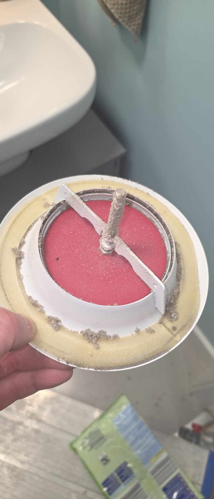 Dust on an extract valve taken down from the ceiling